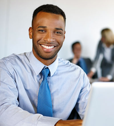Person happily using AccessAble on a computer